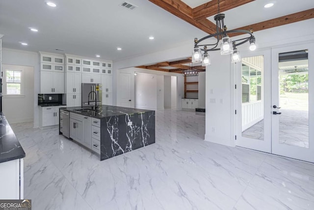 140 Maranatha Trl, Lawrenceville, GA 30045 - kitchen featuring french doors, a sink, recessed lighting, plenty of natural light, and white cabinetry