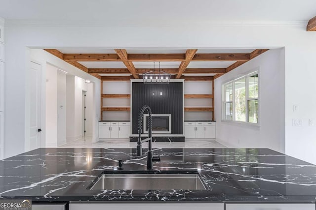 140 Maranatha Trl, Lawrenceville, GA 30045 - kitchen featuring a sink, coffered ceiling, dark stone countertops, open shelves, and beam ceiling