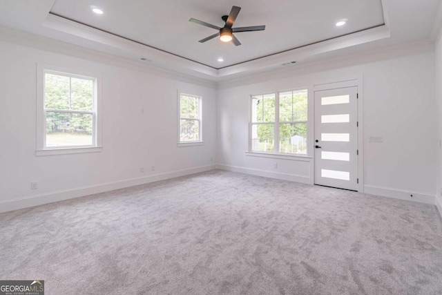 140 Maranatha Trl, Lawrenceville, GA 30045 - carpeted empty room featuring a tray ceiling, healthy amount of natural light, crown molding, and recessed lighting