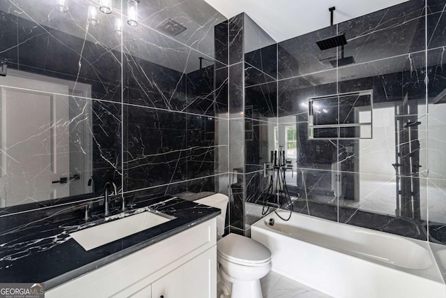 140 Maranatha Trl, Lawrenceville, GA 30045 - full bathroom with tile walls, marble look tiles, vanity, toilet, and a combined bath / shower with rainfall shower