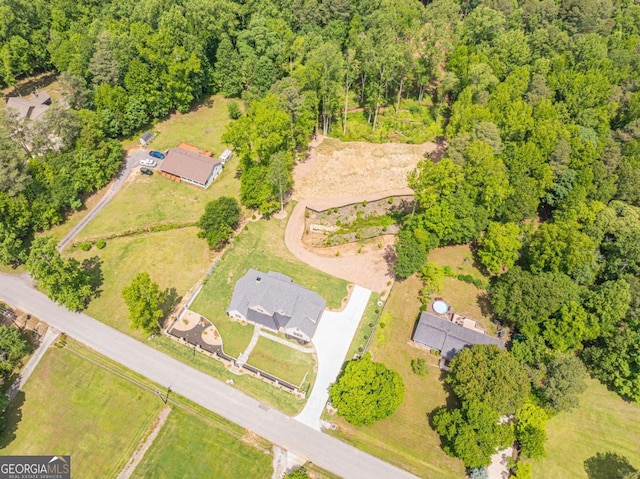 140 Maranatha Trl, Lawrenceville, GA 30045 - drone / aerial view of a heavily wooded area