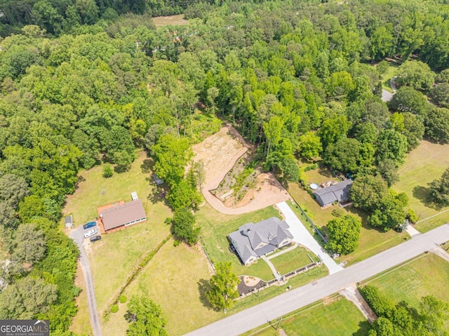 140 Maranatha Trl, Lawrenceville, GA 30045 - aerial overview of property's location with a forest