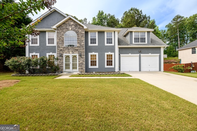 colonial house featuring stucco siding, driveway, stone siding, roof with shingles, and a garage