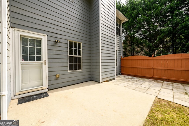 view of patio with fence