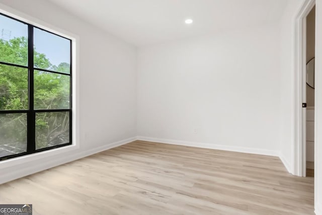 683 Highland Ct, Marietta, GA 30068 - unfurnished room with light wood-style flooring, baseboards, and recessed lighting