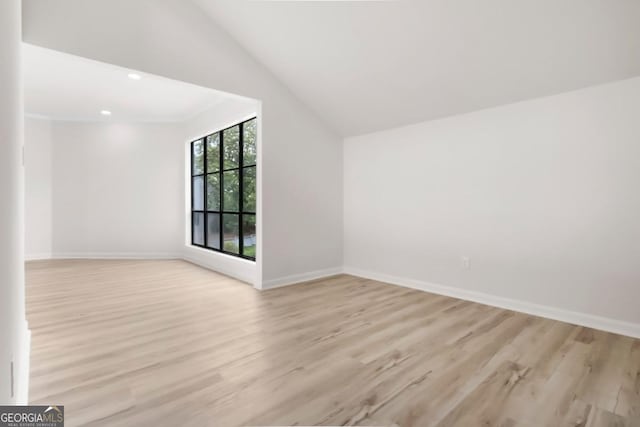 683 Highland Ct, Marietta, GA 30068 - bonus room featuring light wood-style floors, baseboards, vaulted ceiling, and recessed lighting