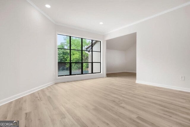 683 Highland Ct, Marietta, GA 30068 - spare room with crown molding, baseboards, light wood finished floors, and recessed lighting