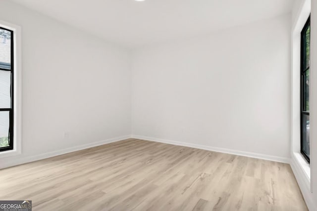 683 Highland Ct, Marietta, GA 30068 - unfurnished room with light wood-style flooring and baseboards
