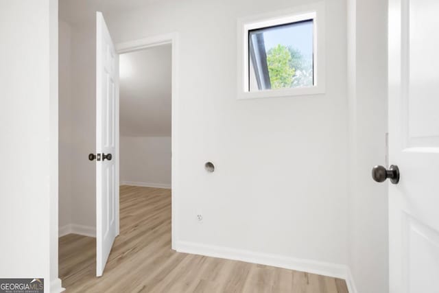 683 Highland Ct, Marietta, GA 30068 - corridor featuring baseboards and light wood finished floors