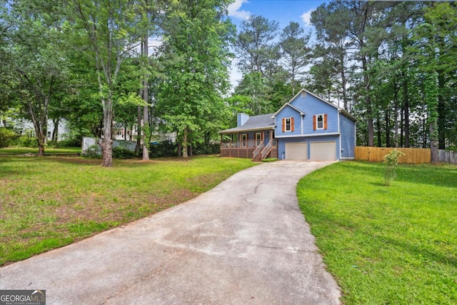 191 Nectar Pl, Dallas, GA 30132 - tri-level home featuring a garage, driveway, stairway, a porch, and a chimney
