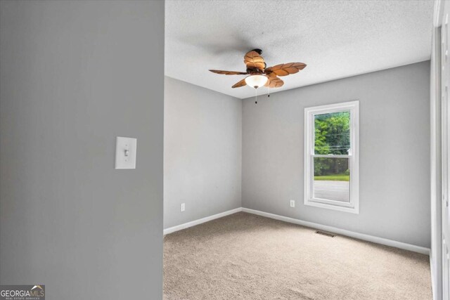 191 Nectar Pl, Dallas, GA 30132 - empty room with a ceiling fan, carpet floors, baseboards, and a textured ceiling