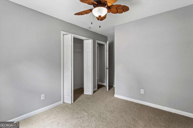 191 Nectar Pl, Dallas, GA 30132 - unfurnished bedroom featuring light carpet, baseboards, a closet, and ceiling fan