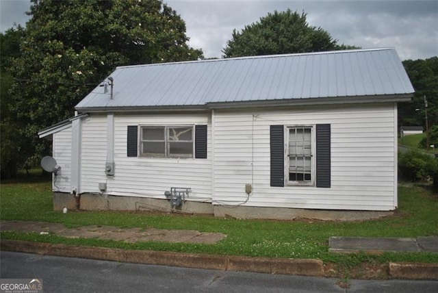 701 Fletcher St, Cedartown, GA 30125 - view of home's exterior featuring metal roof