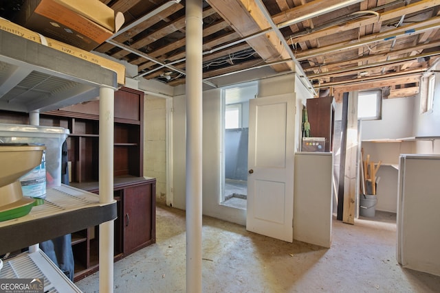 basement featuring plenty of natural light
