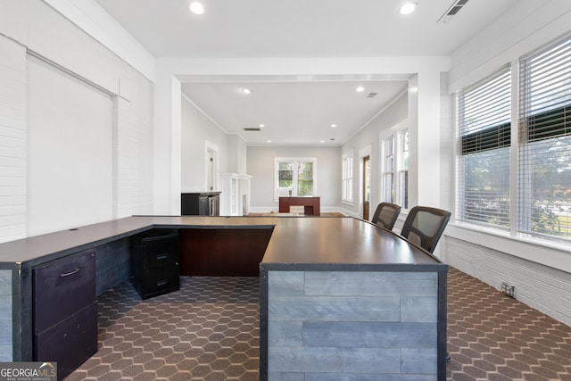 kitchen featuring a desk, dark countertops, recessed lighting, and open floor plan