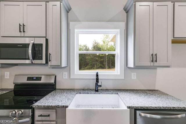 0 Grogan Rd, Buchanan, GA 30113 - kitchen featuring stainless steel appliances, a sink, and light stone counters