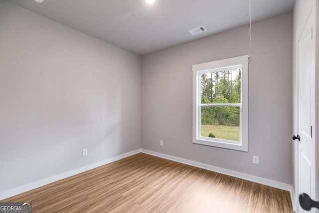 0 Grogan Rd, Buchanan, GA 30113 - unfurnished room with baseboards and wood finished floors