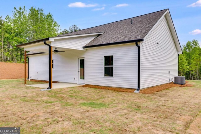 0 Grogan Rd, Buchanan, GA 30113 - back of house with a ceiling fan, roof with shingles, a patio, central AC unit, and a lawn