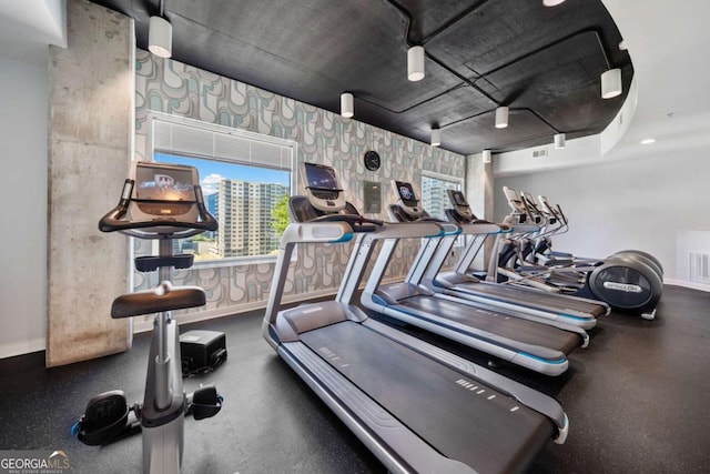 860 Peachtree St NE Unit 1513, Atlanta, GA 30308 - gym with wallpapered walls and baseboards