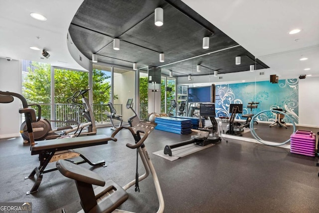 860 Peachtree St NE Unit 1513, Atlanta, GA 30308 - workout area featuring healthy amount of natural light, expansive windows, recessed lighting, and baseboards