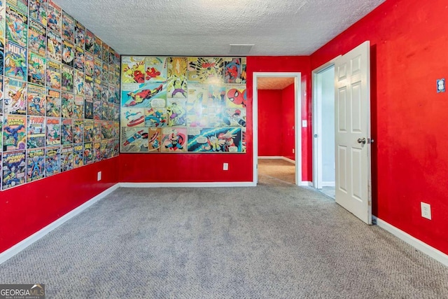 7074 Springgrove Ct, Austell, GA 30168 - carpeted empty room with a textured ceiling and baseboards