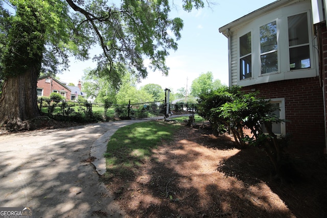 view of yard with fence