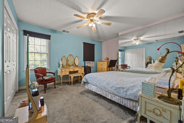 2810 Jodeco Ter, Jonesboro, GA 30236 - bedroom with carpet flooring, a closet, baseboards, a textured ceiling, and a ceiling fan