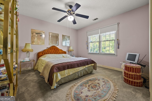 2810 Jodeco Ter, Jonesboro, GA 30236 - carpeted bedroom featuring baseboards, a ceiling fan, and a textured ceiling