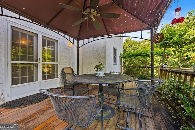 2810 Jodeco Ter, Jonesboro, GA 30236 - wooden deck featuring ceiling fan and outdoor dining space