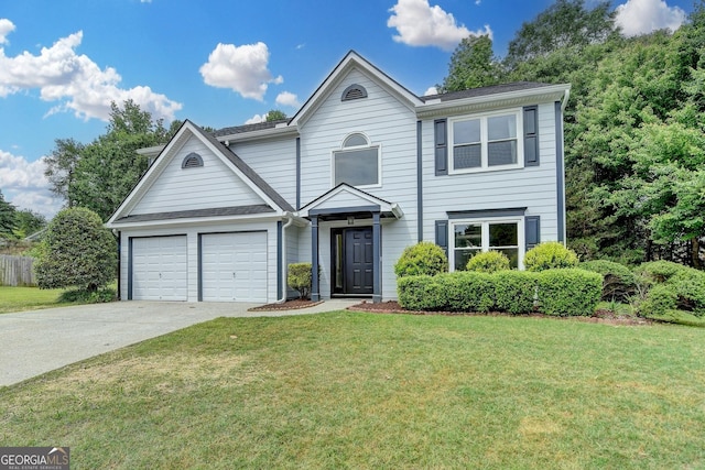 3668 Burel Mill Dr, Buford, GA 30519 - traditional home with driveway, a front yard, and a garage