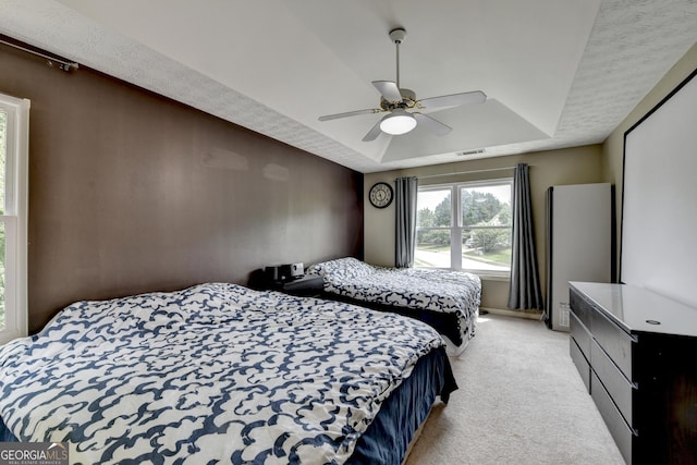 3668 Burel Mill Dr, Buford, GA 30519 - bedroom with a raised ceiling, light colored carpet, a ceiling fan, and baseboards