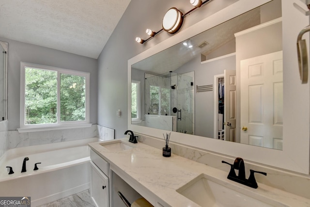 3668 Burel Mill Dr, Buford, GA 30519 - full bathroom with vaulted ceiling, a marble finish shower, a bath, a textured ceiling, and double vanity