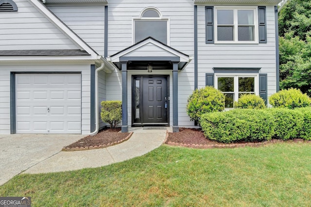 3668 Burel Mill Dr, Buford, GA 30519 - doorway to property featuring a lawn and driveway