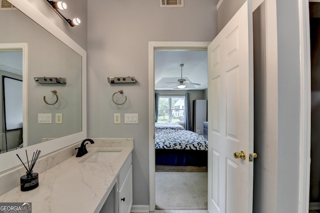 3668 Burel Mill Dr, Buford, GA 30519 - ensuite bathroom with ceiling fan, vanity, and baseboards