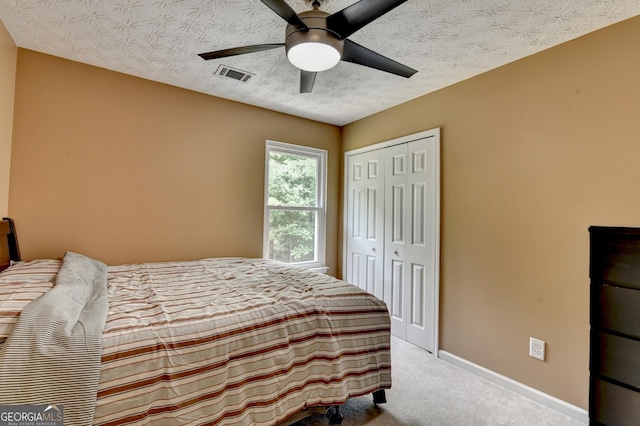 3668 Burel Mill Dr, Buford, GA 30519 - carpeted bedroom with a closet, baseboards, and a ceiling fan