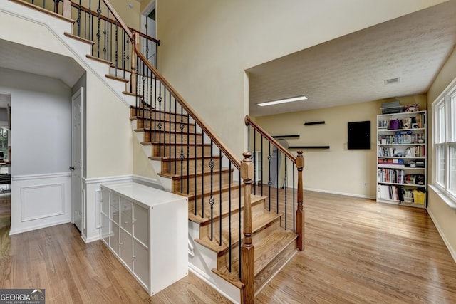 3668 Burel Mill Dr, Buford, GA 30519 - stairway featuring wood finished floors and baseboards