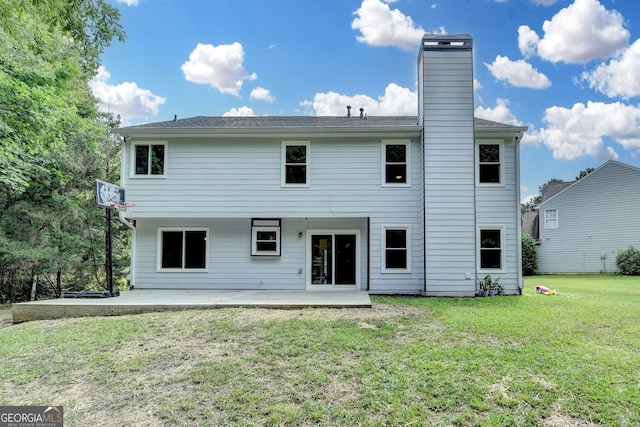 3668 Burel Mill Dr, Buford, GA 30519 - back of house with a patio area, a lawn, and a chimney