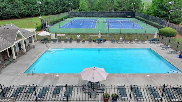 3668 Burel Mill Dr, Buford, GA 30519 - community pool featuring fence, a tennis court, and a patio