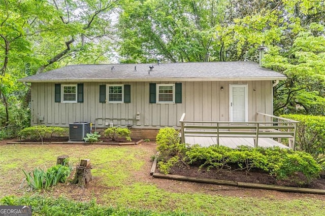 4171 Whispering Forest Ct SW, Lilburn, GA 30047 - view of front of home featuring central air condition unit and board and batten siding