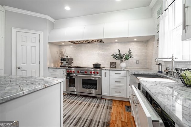 5370 Newport Bay, Alpharetta, GA 30005 - kitchen with double oven range, a sink, white cabinetry, ornamental molding, and tasteful backsplash
