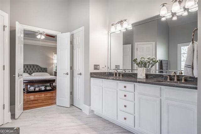 5370 Newport Bay, Alpharetta, GA 30005 - bathroom featuring a ceiling fan, double vanity, connected bathroom, and baseboards