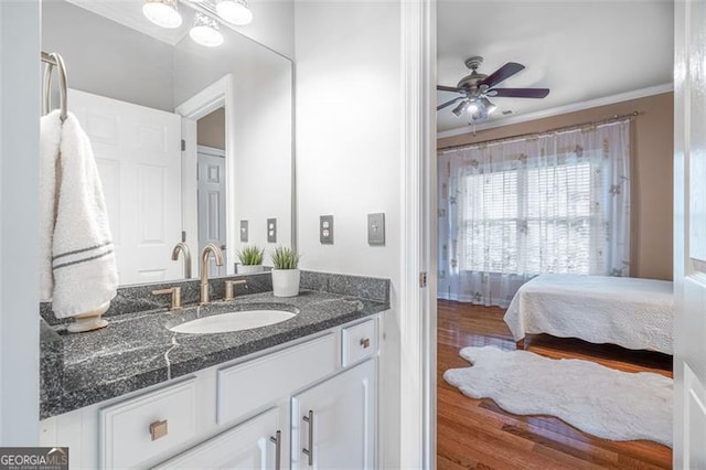5370 Newport Bay, Alpharetta, GA 30005 - bathroom with wood finished floors, vanity, ceiling fan, ensuite bath, and crown molding