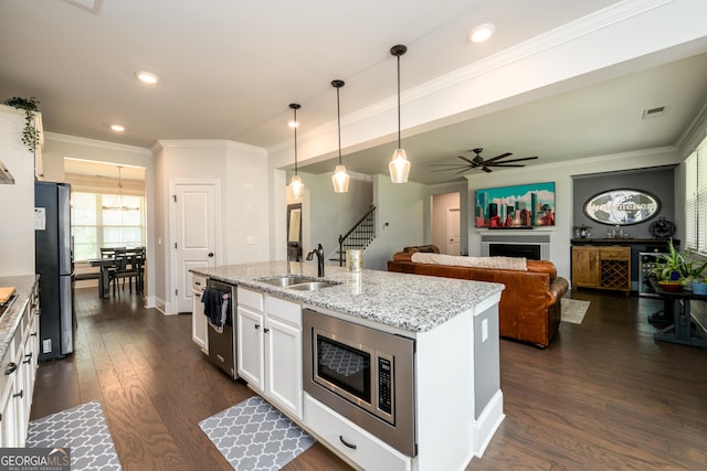 4832 Stone Way Path, Buford, GA 30519 - kitchen with stainless steel appliances, a sink, white cabinetry, dark wood-type flooring, and ceiling fan