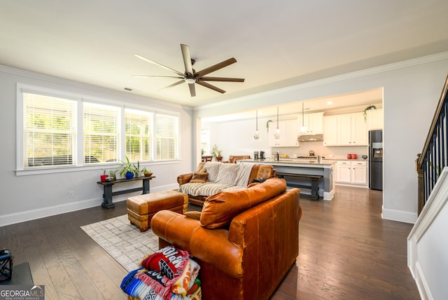 4832 Stone Way Path, Buford, GA 30519 - living area featuring a ceiling fan, crown molding, dark wood-style floors, and baseboards