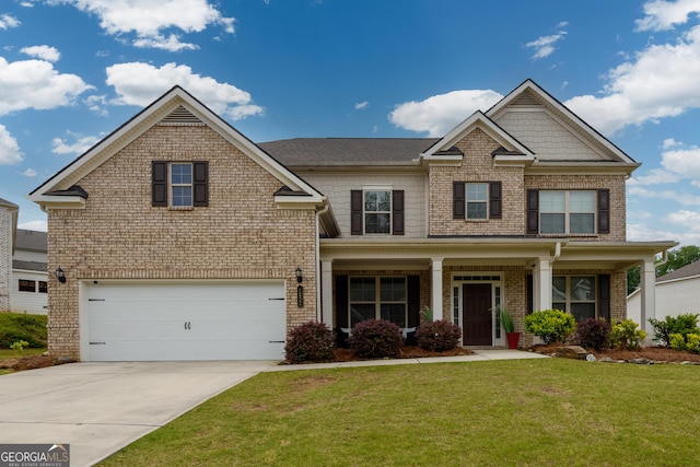 4832 Stone Way Path, Buford, GA 30519 - craftsman inspired home with brick siding, an attached garage, a front lawn, and concrete driveway