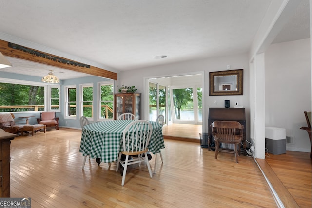 312 Flat Shoals Church Rd, Stockbridge, GA 30281 - dining area featuring plenty of natural light and light wood-style floors