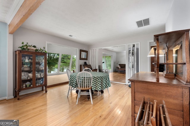 312 Flat Shoals Church Rd, Stockbridge, GA 30281 - dining room featuring light wood-style flooring and baseboards