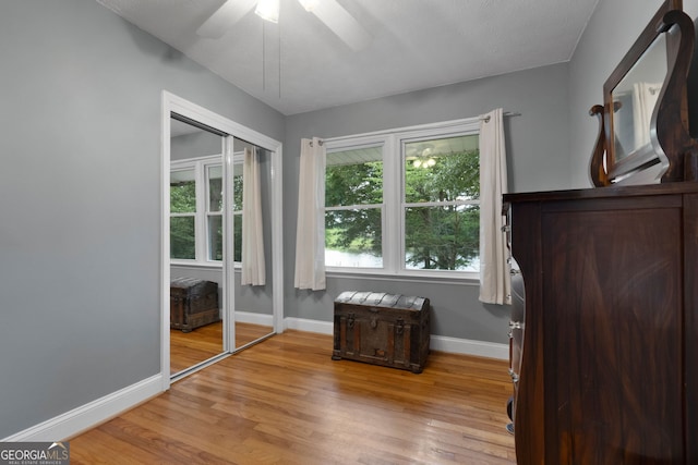 312 Flat Shoals Church Rd, Stockbridge, GA 30281 - bedroom featuring light wood finished floors, baseboards, ceiling fan, and a closet