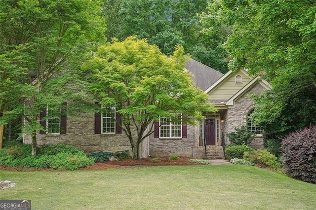 2297 Herring Woods Way, Grayson, GA 30017 - view of front of home with a front yard and brick siding