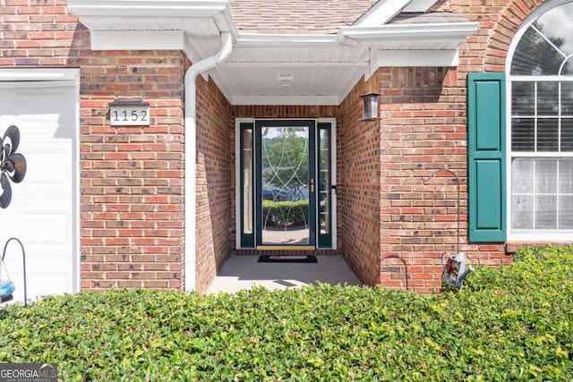 1152 Strath Clyde Way, Mcdonough, GA 30253 - doorway to property with brick siding and a shingled roof